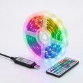RGB LED strip lights glowing in rainbow colours with remote control