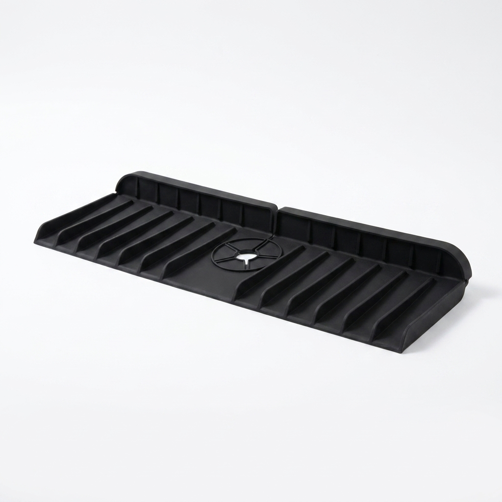Fixless black silicone faucet splash mat with sponge holder for a kitchen sink